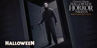 Halloween at Halloween Horror Nights 2022 Michael Myers from Halloween standing in a doorway holding a knife