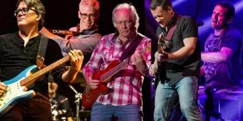 Little River Band at SeaWorld Summer Spectacular A montage of 5 members of a band playing instruments on stage