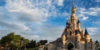 Sleeping Beauty Castle in front of a blue sky 