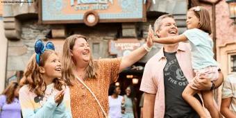 Frozen Ever After at Walt Disney World A family high-fiving while walking away from the Frozen Ever After Ride at Disney World