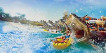 Yas Waterworld There are 6 slides ending up in a pool which end with people zooming out of an open snake's mouth statue. Everyone is sat in either a single or a double rubber ring.