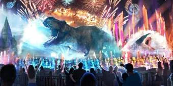 CineSational: A Symphonic Spectacular Artist concept of show full of drones in the sky creating movie scenes, large projection of t-rex and jaws, fireworks going off beside Hogwarts castle and fountains shooting from lake.