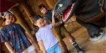 A memorable character encounter with Hiccup and Toothless from How to Train Your Dragon, showcasing a must-do, immersive experience at Universal Orlando Resort.