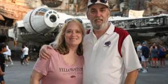 Couple in front of Millennium Falcon