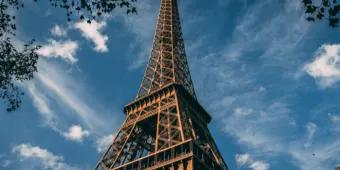 A view looking up at the Eiffel Tower in Paris