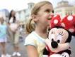 Girl with Minnie Mouse Plush in Magic Kingdom