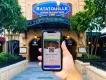 Customer showing a Standby Pass at the Ratatouille: The Adventure entrance at Disneyland Paris