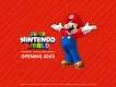 Super Nintendo World Opening 2023 An image of Super Mario on a red background, next to the text "Super Nintendo World, Opening 2023"