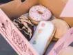 Voodoo Doughnuts A box of iced ring and filled doughnuts from Voodoo Doughnuts