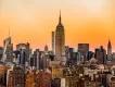 New York City Buildings in New York with the Empire State Building in the centre, during sunset