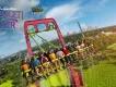 Serengeti Flyer Concept art for Serengeti Flyer, with guests on the ride swinging above Busch Gardens