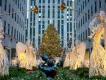 Christmas in New York City Glowing angel decorations in front of the Rockefeller Center Christmas Tree