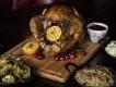 Thanksgiving in Orlando A roast turkey stuffed with lemon and herbs, with stuffing, mashed potatoes and brussel sprouts