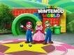 Super Nintendo World at Universal Studios Hollywood An artist rendering of Mario, Luigi and Princess Peach standing in front of the entrance to Super Nintendo World at Universal Studios Hollywood