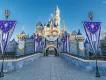 Sleeping Beauty Castle A pink and blue castle decorated with silver and blue banners and pendants