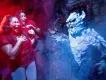 Halloween Horror Nights 2024 Two women screaming as someone dressed as a snow covered yeti jumps out at them in a haunted house