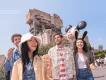 Disneyland Paris Premier Access A group of four friends in their twenties walking in front of Tower of Terror in Walt Disney Studios