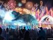 CineSational: A Symphonic Spectacular Artist concept of show full of drones in the sky creating movie scenes, large projection of t-rex and jaws, fireworks going off beside Hogwarts castle and fountains shooting from lake.