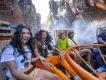 Kali River Rapids A group of friends getting splashed on a river raft ride