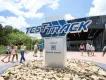 Test Track in EPCOT The white sign with blue text in capital letters saying "TEST TRACK".