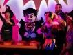 LEGOLAND Dubai Halloween Dracula lego character danging by lego dj deck with kids gethered around wearing halloween costumes.