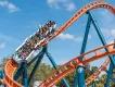 Ice Breaker's orange track twisting through steep drops and turns at SeaWorld Orlando