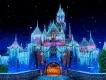 Sleeping Beauty Castle at Disneyland Resort glowing at night with shimmering icicle lights, holiday wreaths, snow-capped turrets, and falling snow effect
