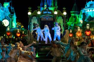 The hitchhiking ghosts on a parade float in Mickey's Boo To You Halloween Parade