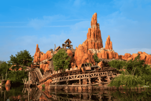 Looking over a river towards Big Thunder Mountain roller coaster