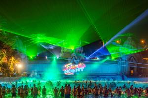 Strobe lights illuminating the beach at Siam Park during Siam Night