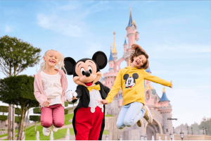Guests with Mickey Mouse, Disneyland® Park