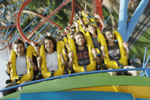 Four people on a roller coaster at PortAventura World