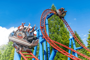 Riders on the Spinball Whizzer roller coaster at Alton Towers