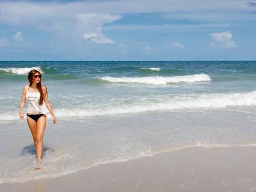 Woman paddling on Clearwater Beach