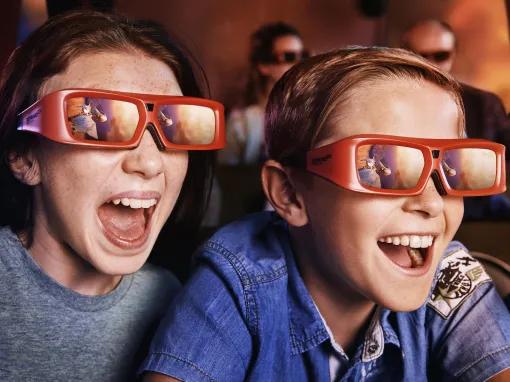 Boy's riding the 4D bus at Shrek's Adventure London