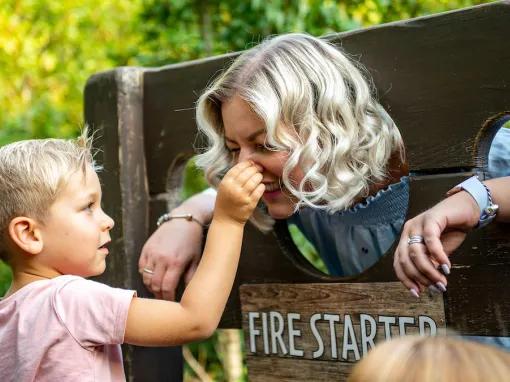 Mother and son enjoying Horrible Histories maze at Warwick Castle