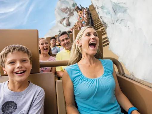 Guests riding Expedition Everest  at Disney's Animal Kingdom Theme Park
