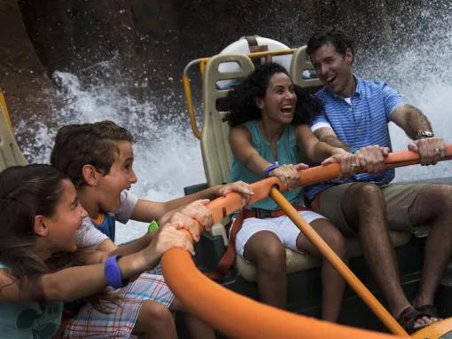 Guests getting wet on Kali River Rapids at Disney's Animal Kingdom Theme Park