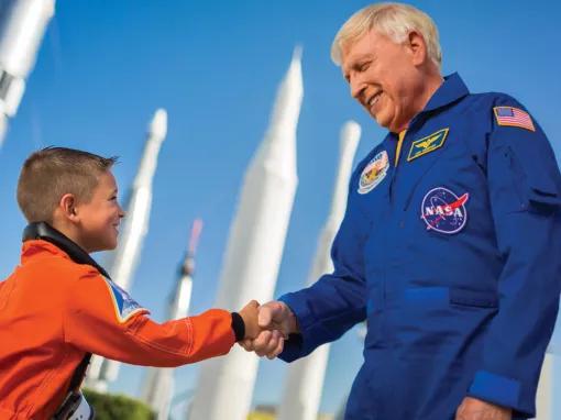 Boy meeting an astronaut at Kennedy Space Center