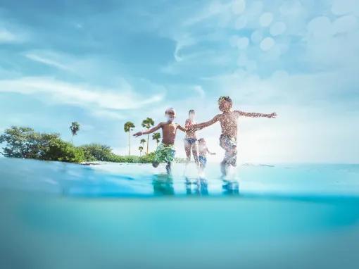 Boys playing on Clearwater Beach in Florida