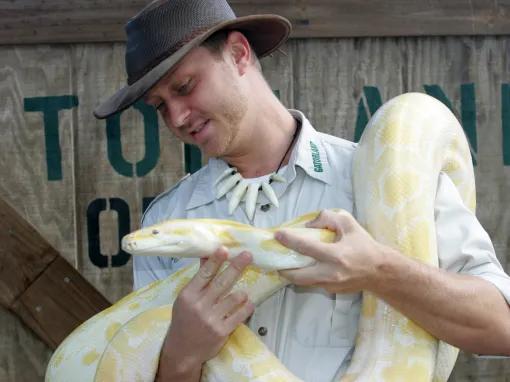 Zoo keeper with Yellow Boa at Gatorland in Florida