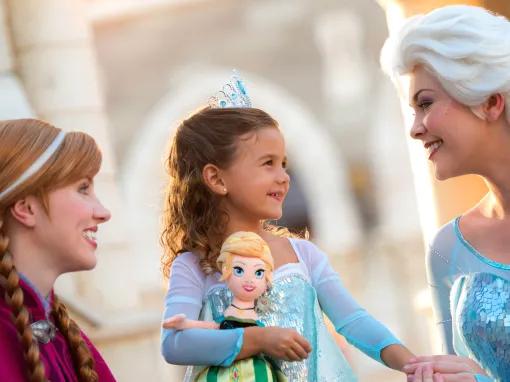 Girl meeting Elsa and Anna at Epcot