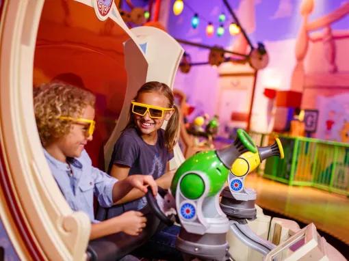 Girls enjoying Toy Story Mania at Disney's Hollywood Studios