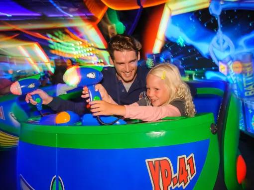 Father and Daughter on Buzz Lightyear Laser Blast at Disneyland Paris