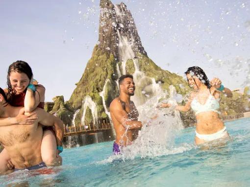 Guests playing on Waturi Beach at Universal's Volcano Bay Water Theme Park
