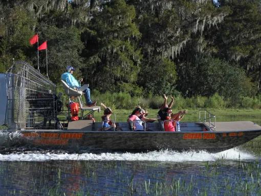 Guests enjoying an airboat ride at Boggy Creek Orlando