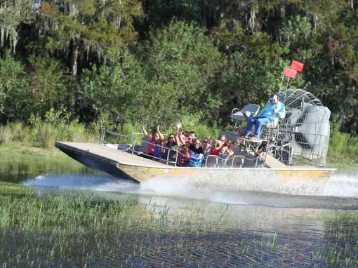 Guests enjoying an airboat ride at Boggy Creek Orlando