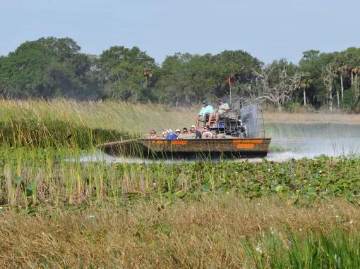 Guests enjoying an airboat ride at Boggy Creek Orlando