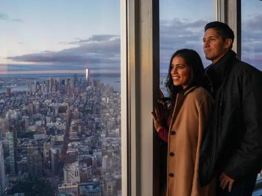 Couple enjoying the views from the 80th Floor Observatory at the Empire State Building