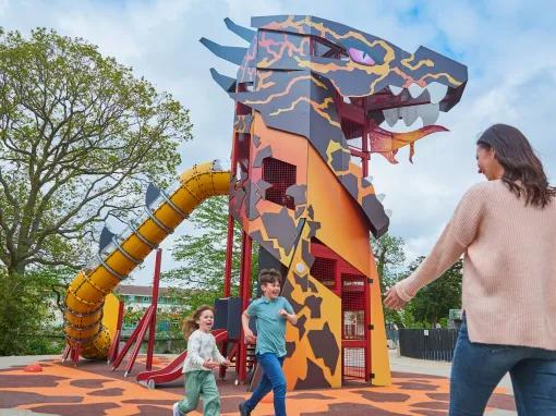 Family in LEGO® MYTHICA’s-themed playground at LEGOLAND Windsor